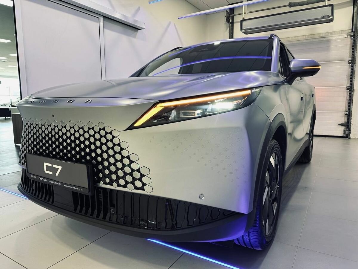 Открыть фотографии: Omoda C7