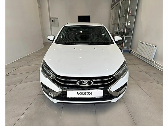 2026 Lada (ВАЗ) Vesta I Рестайлинг (NG), белый, 1663200 рублей - вид 1