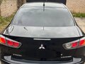 2012 Mitsubishi Lancer X Рестайлинг, чёрный, 520000 рублей - вид 2