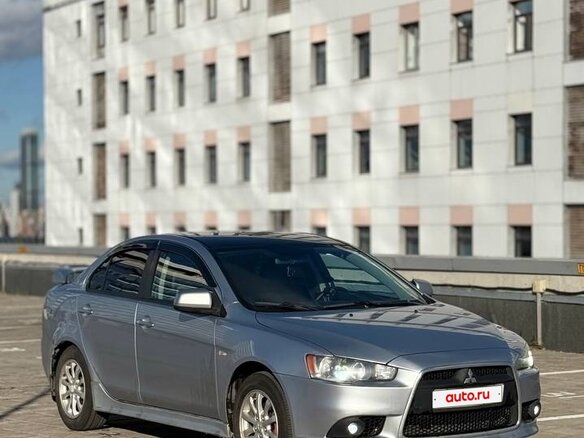 2011 Mitsubishi Lancer X Рестайлинг, серебристый, 660000 рублей - вид 5
