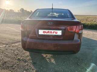 2011 Kia Cerato 6-speed II, красный, 860000 рублей, вид 4