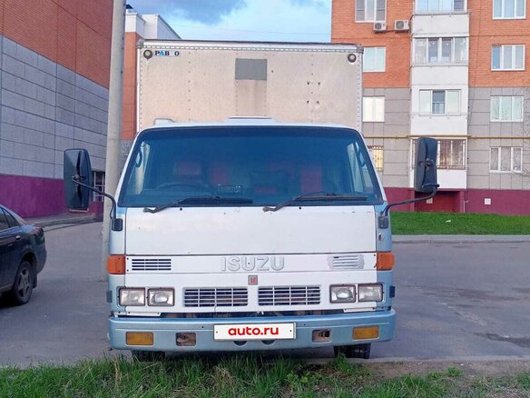 1992 Isuzu Elf (N-series), белый, 600000 рублей - вид 1