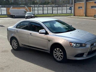 2011 Mitsubishi Lancer X Рестайлинг, серебристый, 555000 рублей, вид 1