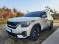 2023 Kia Seltos I, белый, 1853000 рублей