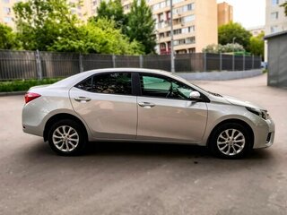 2014 Toyota Corolla XI (E160, E170, E180), серебристый, 1449000 рублей, вид 4