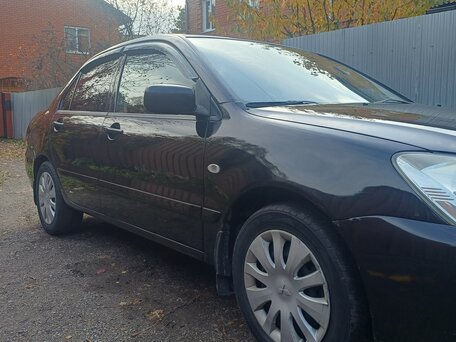 2005 Mitsubishi Lancer IX Рестайлинг, чёрный, 300000 рублей, вид 5