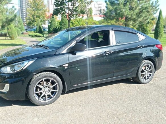 2013 Hyundai Solaris I, чёрный, 1030000 рублей - вид 10