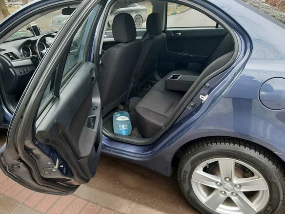 2008 Mitsubishi Lancer X, синий - вид 11