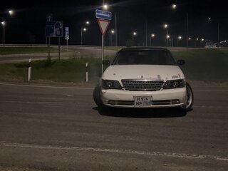 2002 Nissan Laurel VIII (C35), белый, 650000 рублей, вид 2