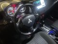 2013 Mitsubishi Lancer X Рестайлинг, чёрный, 1100000 рублей - вид 8