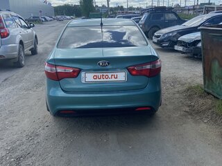 2014 Kia Rio 6-speed III, зелёный, 910000 рублей, вид 3