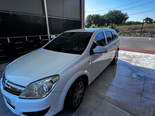 2010 Opel Astra H Рестайлинг, белый, 650000 рублей, вид 1