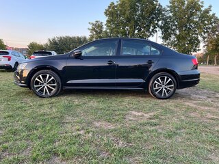 2015 Volkswagen Jetta VI, чёрный, 999000 рублей, вид 3