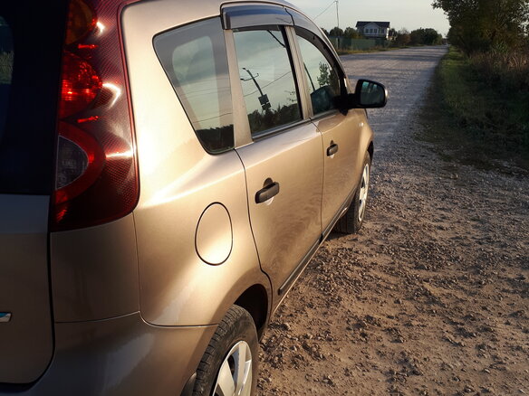 2011 Nissan Note I Рестайлинг, коричневый, 500000 рублей - вид 4