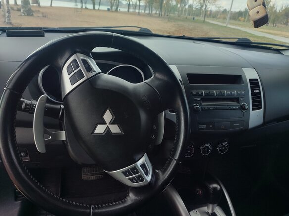 2012 Mitsubishi Outlander II Рестайлинг, чёрный, 1400000 рублей - вид 8