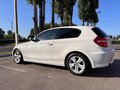 2010 BMW 1 серии 118i I (E81/E82/E87/E88) Рестайлинг, белый, 899000 рублей - вид 5