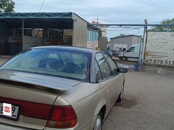 1999 Saturn SL1 II, бежевый, 330000 рублей - вид 1