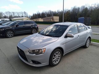 2012 Mitsubishi Lancer X Рестайлинг, серебристый, 830000 рублей, вид 1