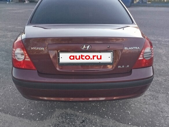 2010 Hyundai Elantra ТагАЗ III (XD2) Рестайлинг, красный - вид 3