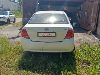 2008 Toyota Corolla Axio X (E140, E150), белый, 699000 рублей, вид 2