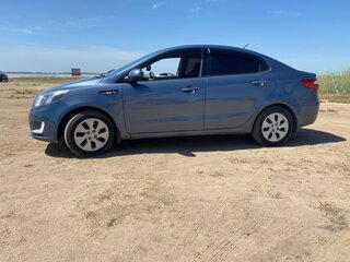 2012 Kia Rio 5-speed III, голубой, 850000 рублей, вид 4