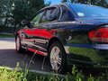 2006 Hyundai Sonata ТагАЗ IV (EF) Рестайлинг, чёрный - вид 2