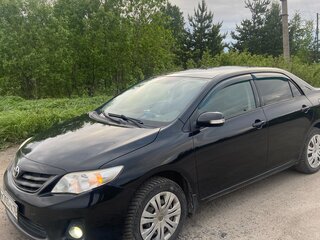 2011 Toyota Corolla X (E140, E150) Рестайлинг, чёрный, 855000 рублей, вид 1