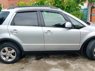 2010 Suzuki SX4 I (Classic) Рестайлинг, серебристый, 600000 рублей, вид 3