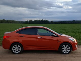 2015 Hyundai Solaris I Рестайлинг, оранжевый, 1085000 рублей, вид 4