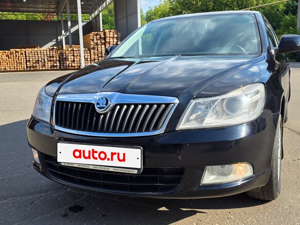 2013 Skoda Octavia II (A5) Рестайлинг, чёрный - вид 1