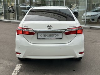 2013 Toyota Corolla XI (E160, E170, E180), белый, 1045000 рублей, вид 4
