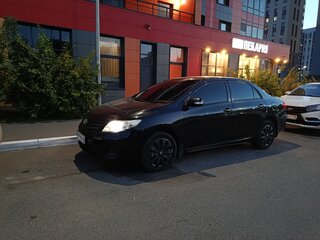 2011 Toyota Corolla X (E140, E150) Рестайлинг, чёрный, 890000 рублей, вид 2