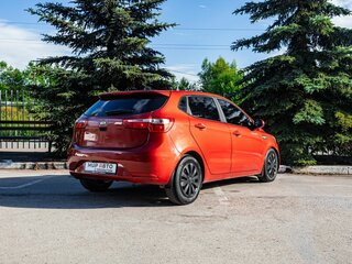 2013 Kia Rio 4-speed III, красный, 805000 рублей, вид 4