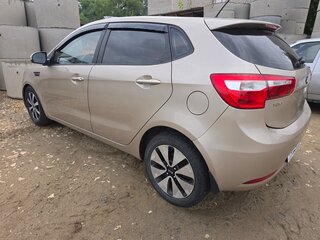 2014 Kia Rio 6-speed III, бежевый, 890000 рублей, вид 4