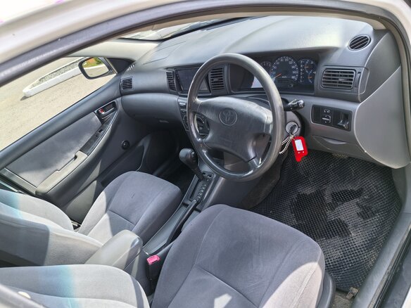 2004 Toyota Corolla IX (E120, E130), белый, 500000 рублей - вид 7