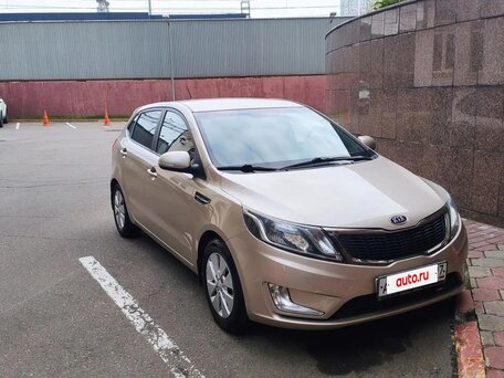 2012 Kia Rio 4-speed III, бежевый, вид 2