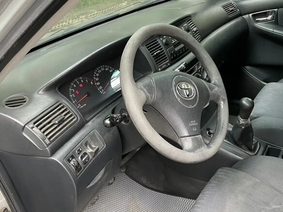 2003 Toyota Corolla IX (E120, E130), серебристый - вид 6