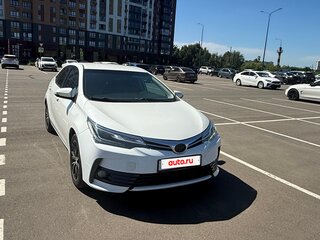 2013 Toyota Corolla XI (E160, E170, E180), белый, 1050000 рублей, вид 2