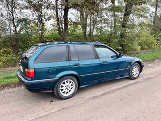 1997 BMW 3 серии 318i III (E36), зелёный, 290000 рублей, вид 4