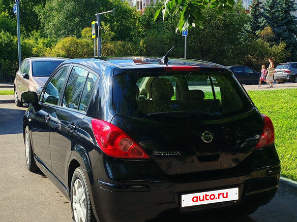 2010 Nissan Tiida I Рестайлинг, чёрный - вид 1
