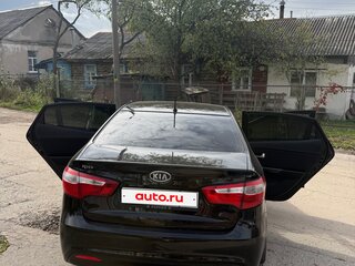 2012 Kia Rio 4-speed III, чёрный, 880000 рублей, вид 4