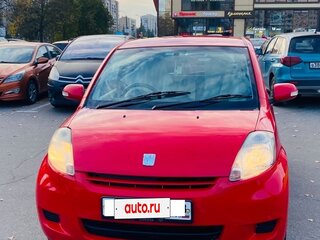 2009 Toyota Passo I (C10), красный, 520000 рублей, вид 1