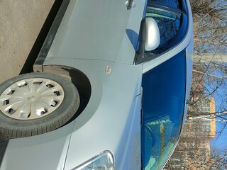 2013 Nissan Almera III (G15), серебристый, 650000 рублей, вид 2