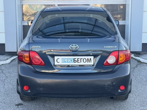 2007 Toyota Corolla X (E140, E150), синий - вид 5