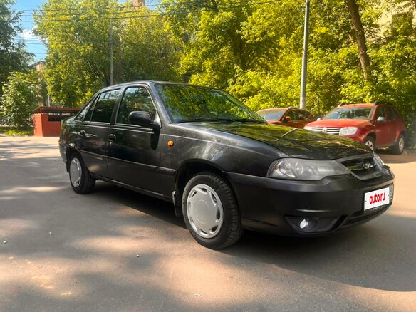2010 Daewoo Nexia I Рестайлинг, чёрный, 140000 рублей - вид 2