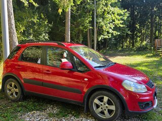 2012 Suzuki SX4 I (Classic) Рестайлинг, красный, 910000 рублей, вид 1