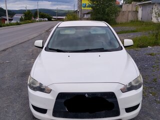 2010 Mitsubishi Lancer X, белый, 650000 рублей, вид 2