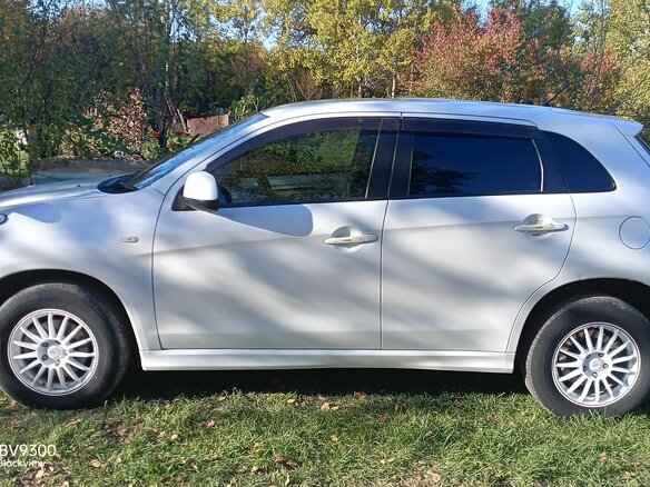 2012 Mitsubishi RVR III, белый, 1100000 рублей - вид 21