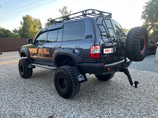 2004 Toyota Land Cruiser 105 100 Series Рестайлинг 1, серый, 4500000 рублей, вид 4