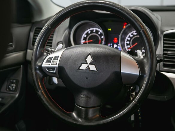 2013 Mitsubishi Lancer X Рестайлинг, серебристый, 990000 рублей - вид 13